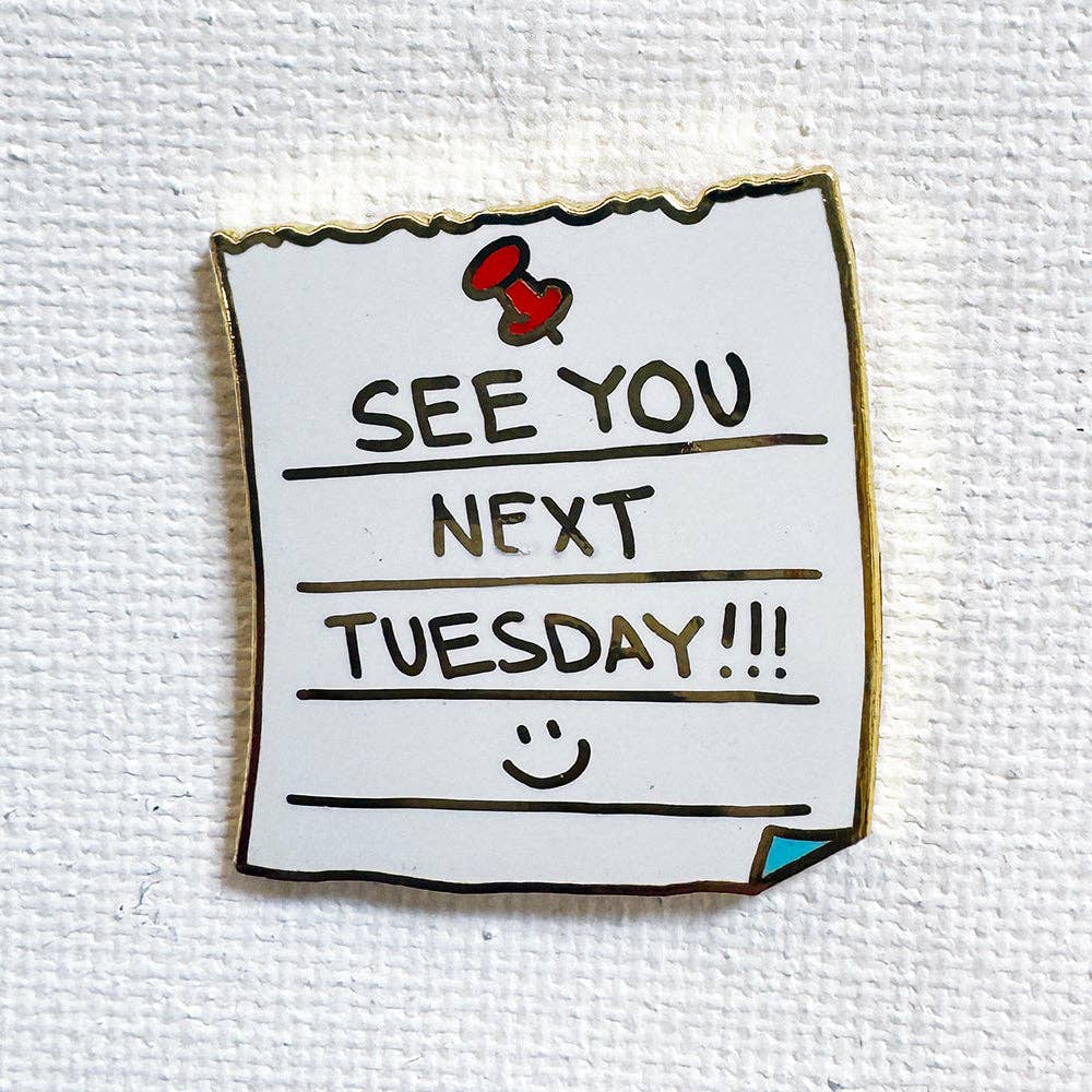 See You Next Tuesday enamel pin featuring a handwritten note design with gold-tone details