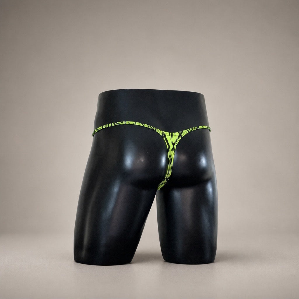 Rear view of Acid Ikat neon yellow-green and black men's Muscle thong by PapiMalo Gear