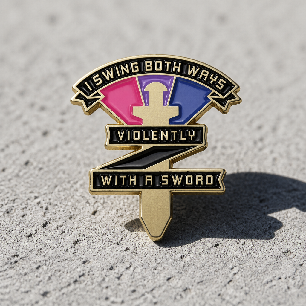 Bisexual Pride enamel pin featuring sword artwork and “My Sword Swings Both Ways” text on a concrete surface