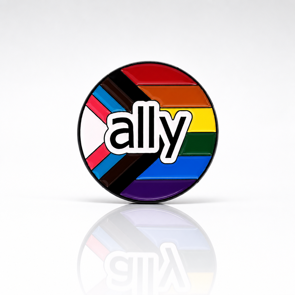 Round Progress Pride enamel pin with “ally” text and rainbow colors