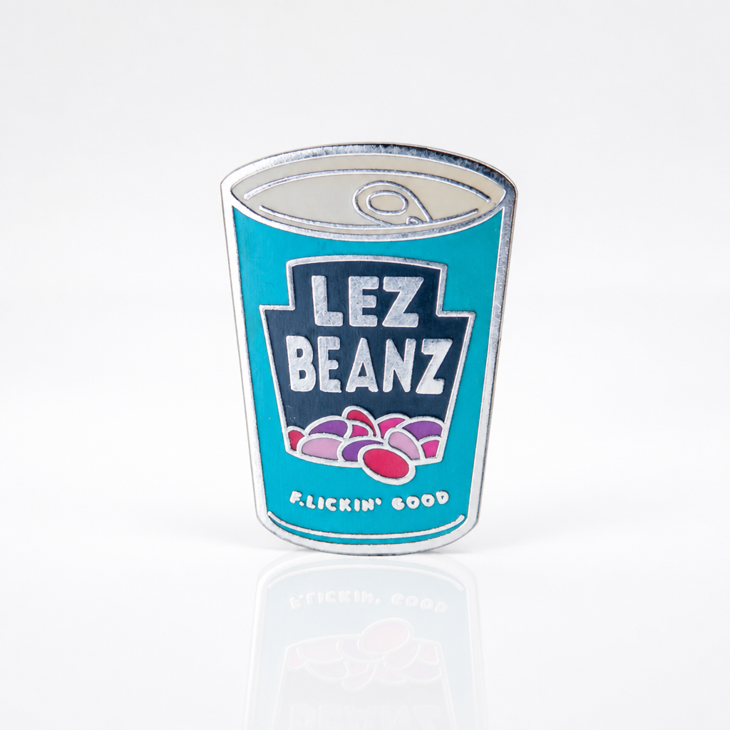 Lez Beanz enamel pin featuring a retro-style can of beans with playful lesbian pride humor