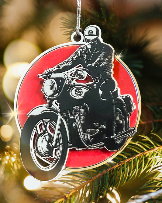 Tom of Finland limited edition biker metal ornament featuring a classic leather-clad motorcyclist on a red background 