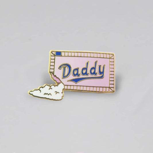 Sugar Daddy enamel pin featuring pastel candy-inspired artwork with gold-tone details