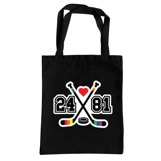 Black Heated Rivalry inspired tote bag with rainbow hockey stick 24/81 design and heart graphic