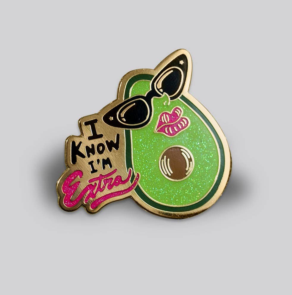 Glitter avocado enamel pin wearing sunglasses with the phrase I Know I'm Extra