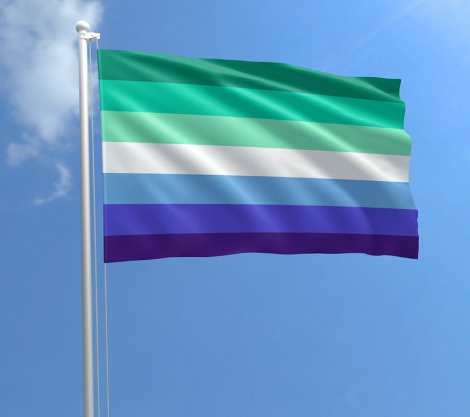 MLM Men Loving Men outdoor pride flag with teal green blue white and purple stripes against a blue sky