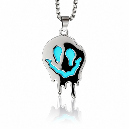 Glow-in-the-dark blue ghost pendant necklace with polished stainless steel finish