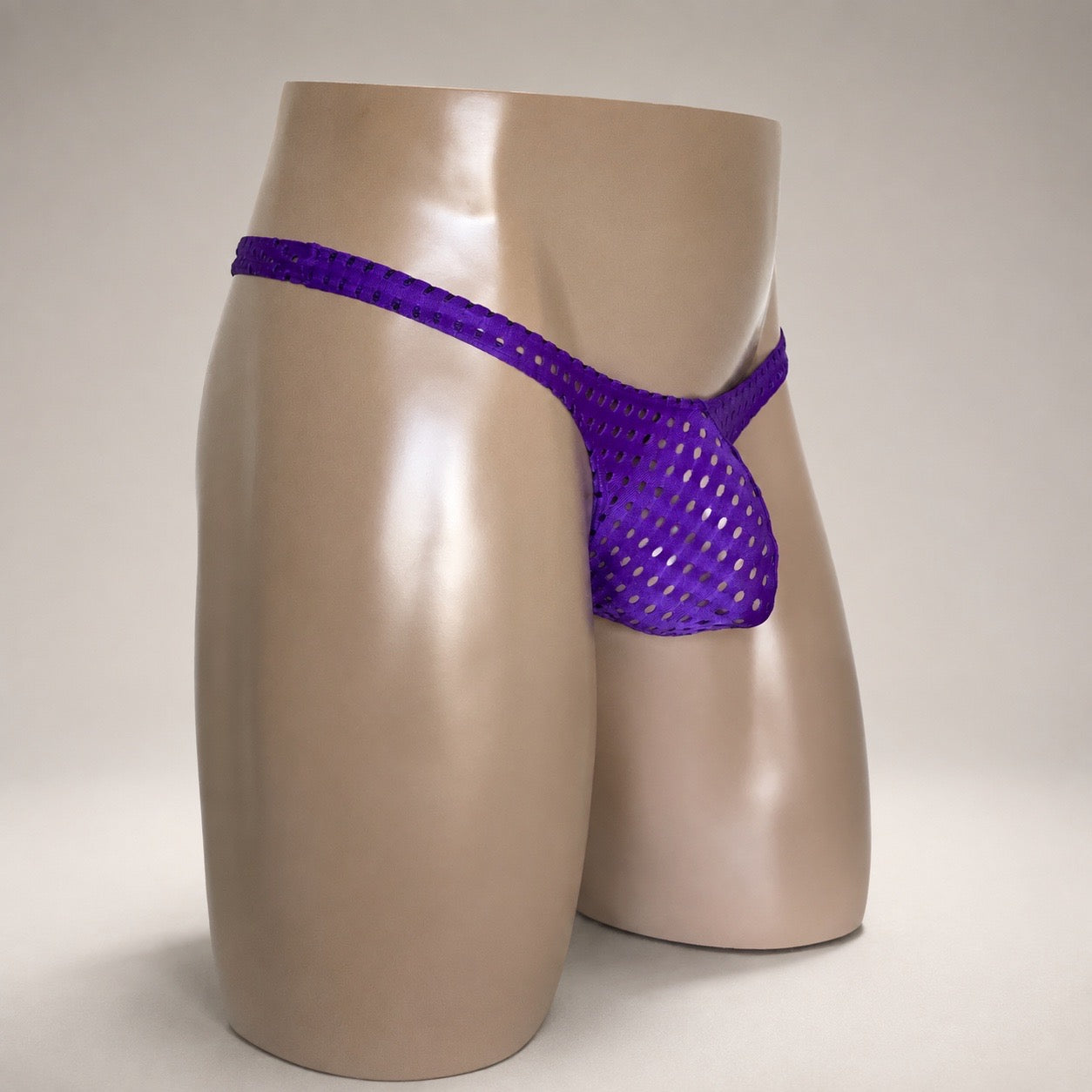 Side view of Purple Rush purple perforated men’s Classic thong by PapiMalo Gear