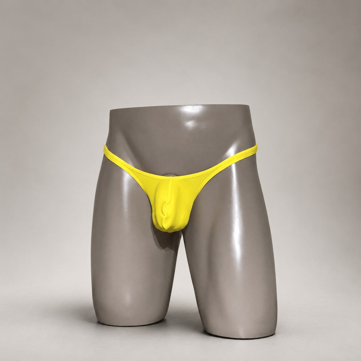 Front view of Solar Flash bright yellow men’s Classic thong by PapiMalo Gear