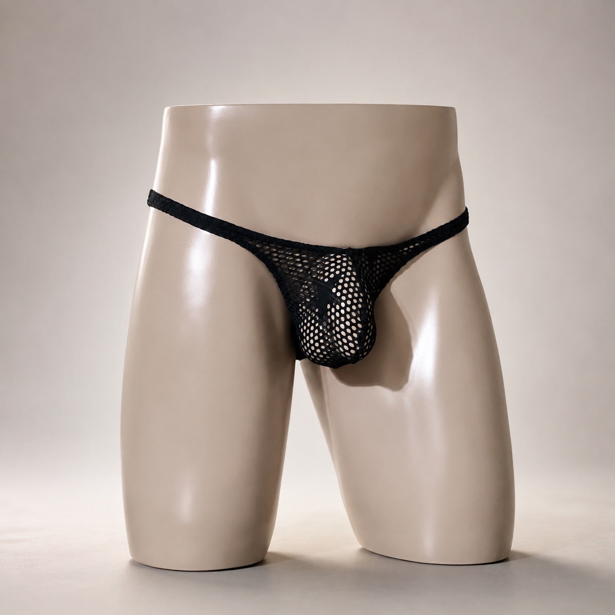 Front view of Blackout black open mesh men’s Classic thong by PapiMalo Gear
