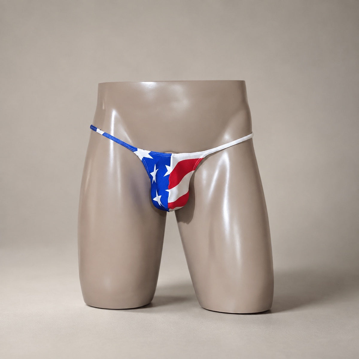 Front View of Stars & Stripes red, white and blue flag-print men’s Muscle thong by PapiMalo Gear