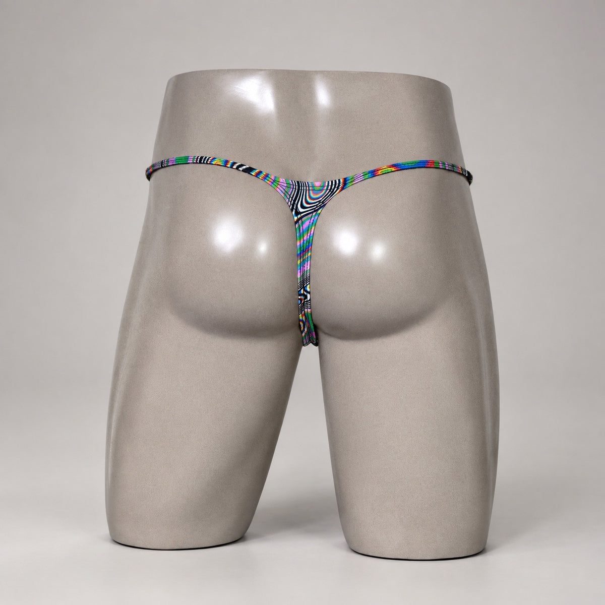 Rear View of Kaleidoscope Drift multicolor optical-print men’s Muscle thong by PapiMalo Gear