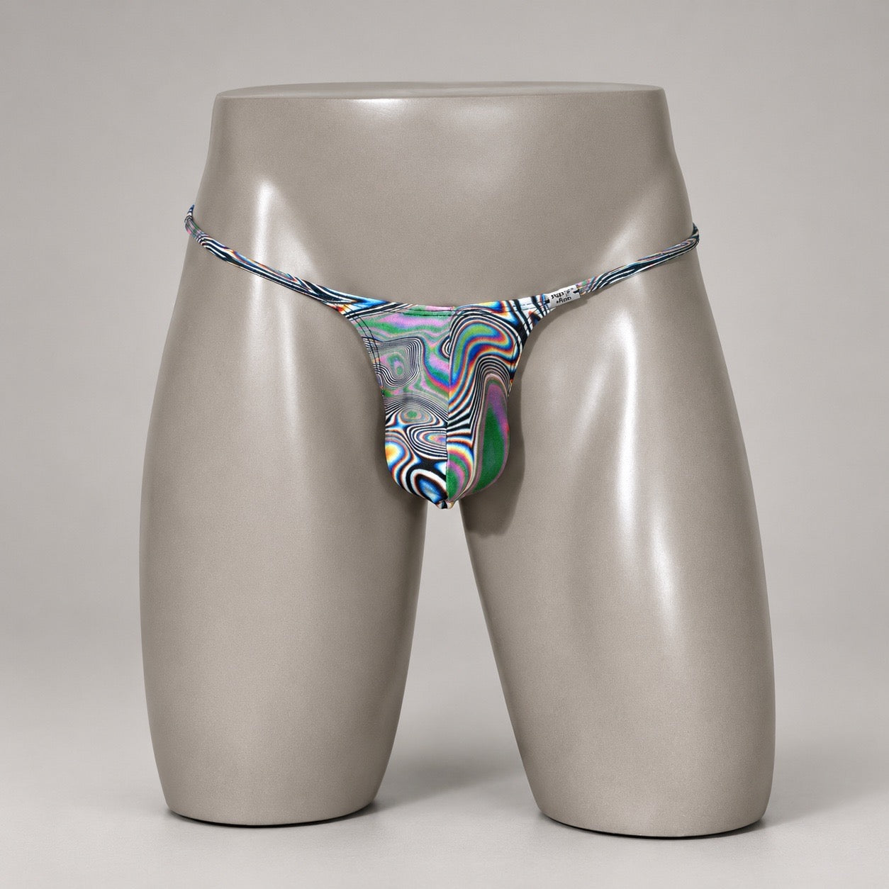 Front View of Kaleidoscope Drift multicolor psychedelic men’s Muscle thong by PapiMalo Gear