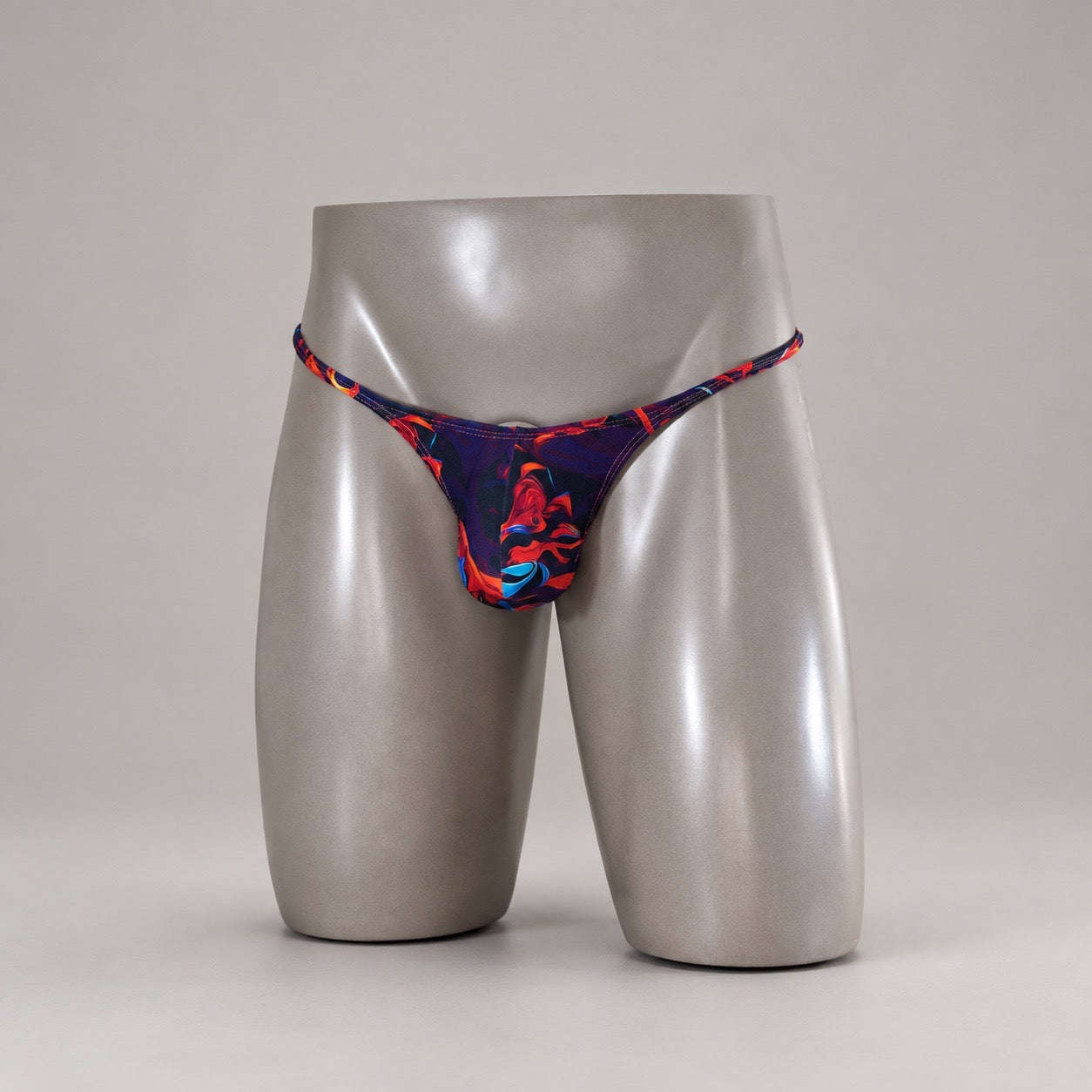 Front view of Molten Ember violet and red abstract men's Muscle thong by PapiMalo Gear