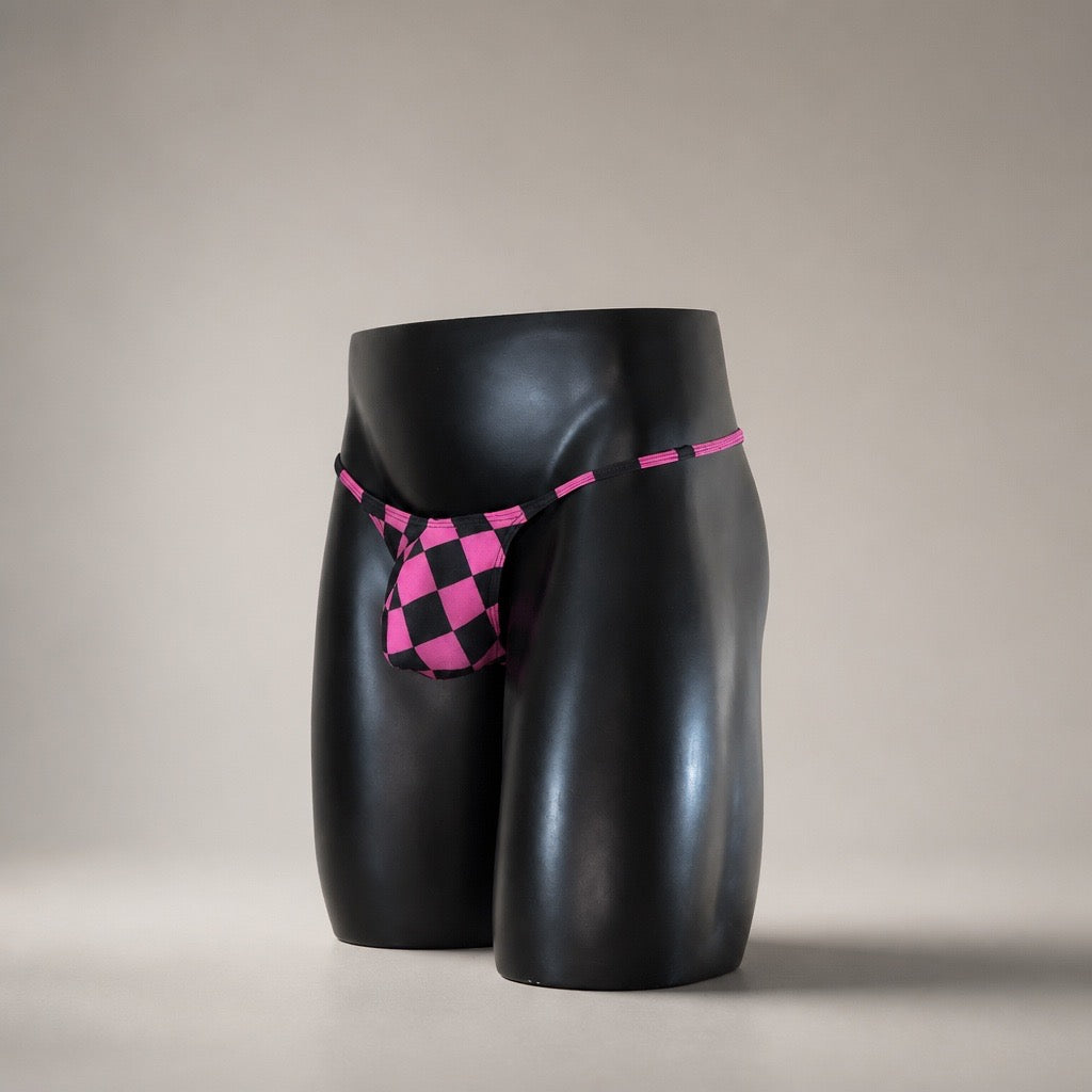 Front angle of Warp Speed hot pink and black checkerboard men's Muscle thong by PapiMalo Gear