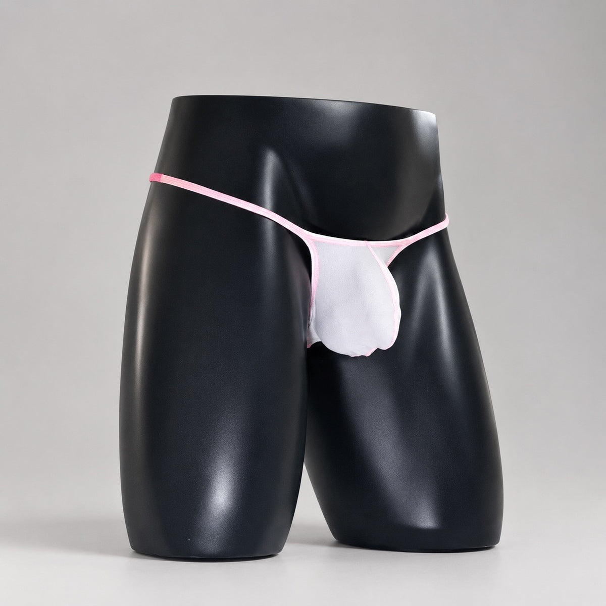Front angle of Pink Reveal white and pale pink men's Muscle thong by PapiMalo Gear