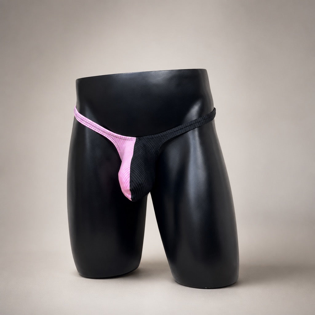 Front angled view of PapiMalo Duo - Velvet Riot pink and black Classic thong