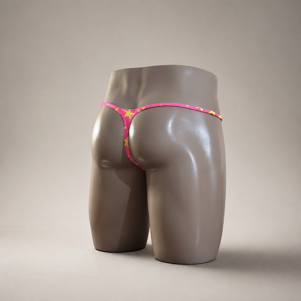 Rear Side View of Popstar Muscle Thong with pink star-print waistband and narrow back by PapiMalo Gear