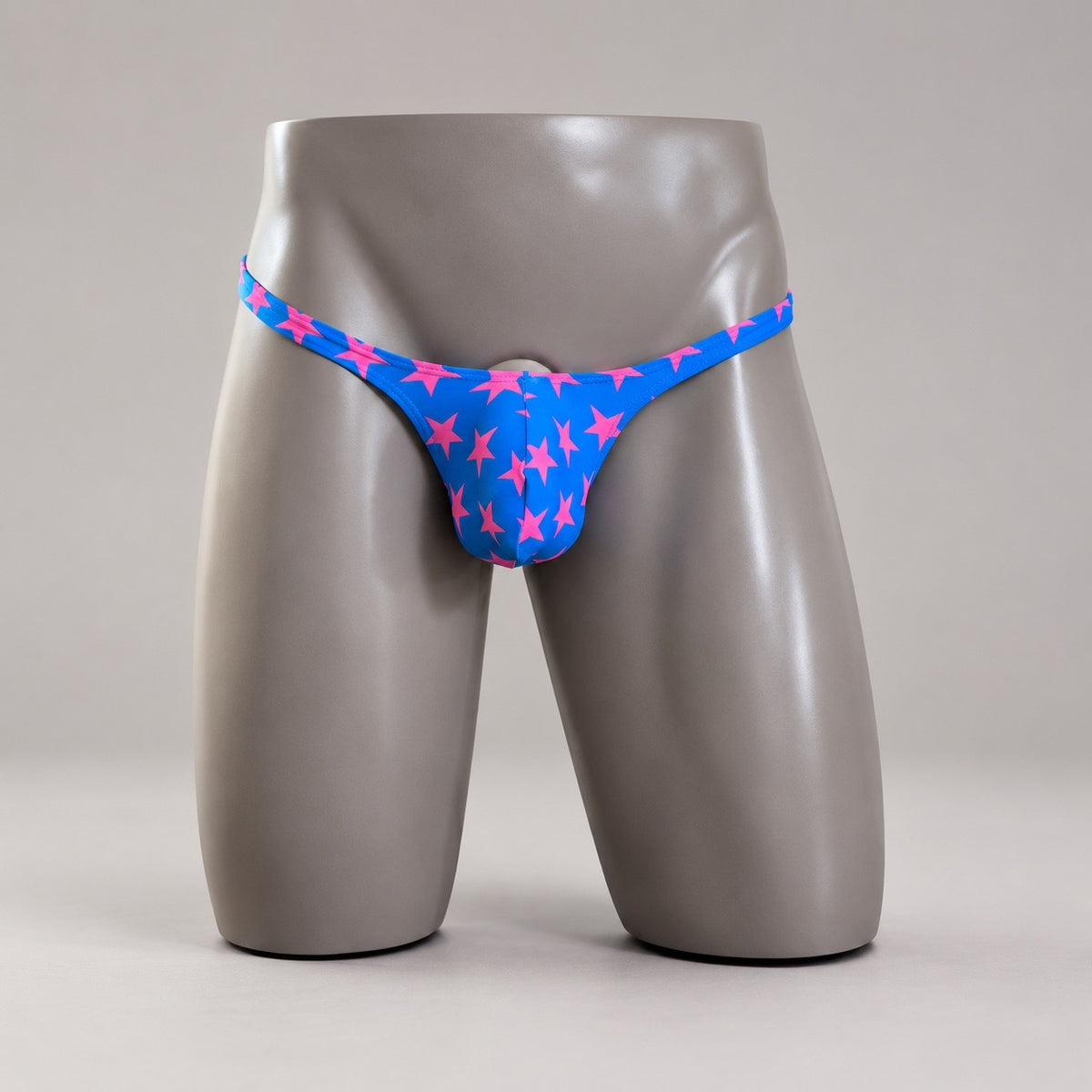 Front View of Electric All-Star Classic Thong blue and pink star men’s thong by PapiMalo Gear