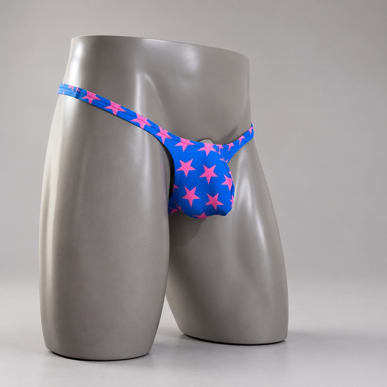 Side View of Electric All-Star Classic Thong blue and pink star men’s thong by PapiMalo Gear