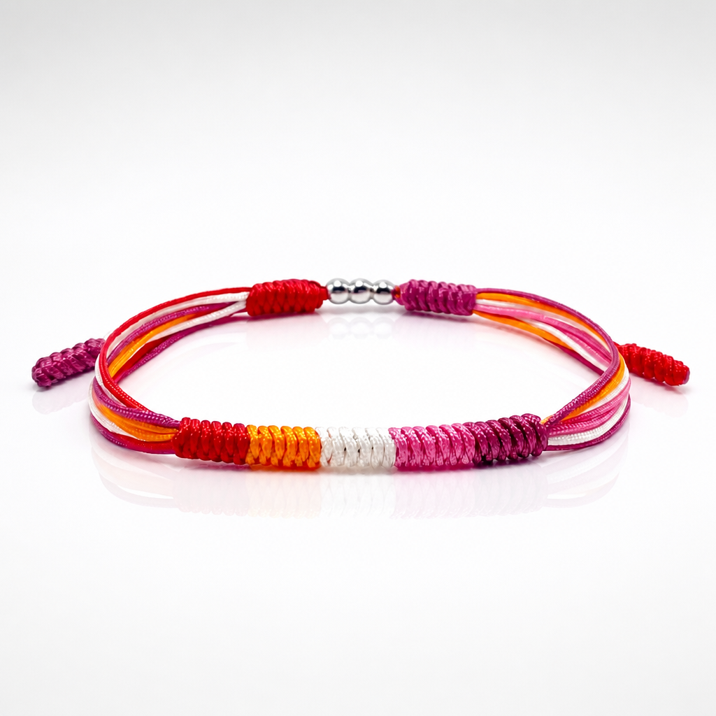 Lesbian Pride braided cord bracelet with adjustable closure in pink white orange and red pride colors  on a white background