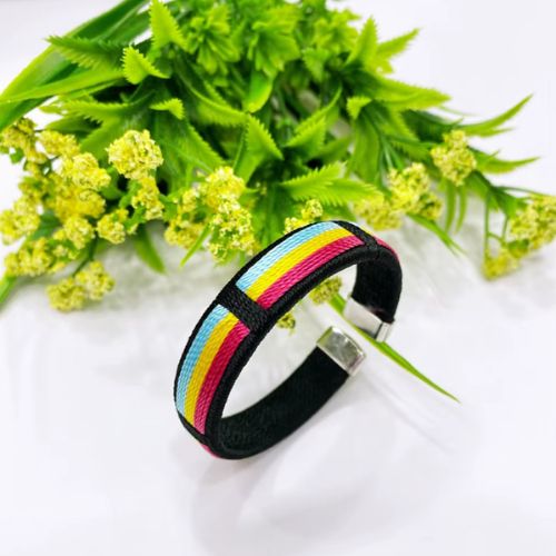 Pansexual pride woven cuff bracelet with pink yellow and blue stripe design