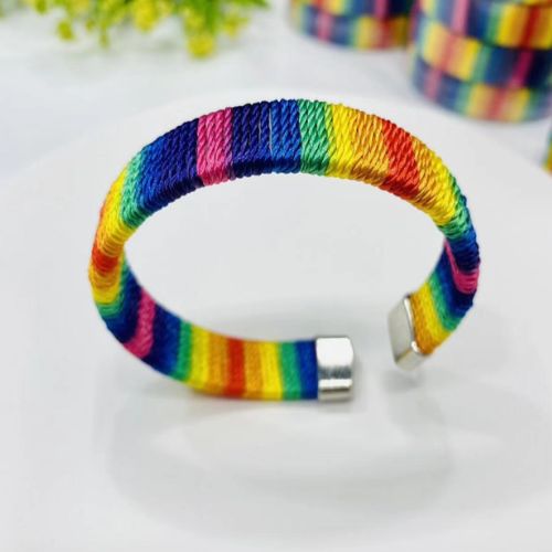 Tropical rainbow pride woven cuff bracelet with vibrant multicolor thread stripe design