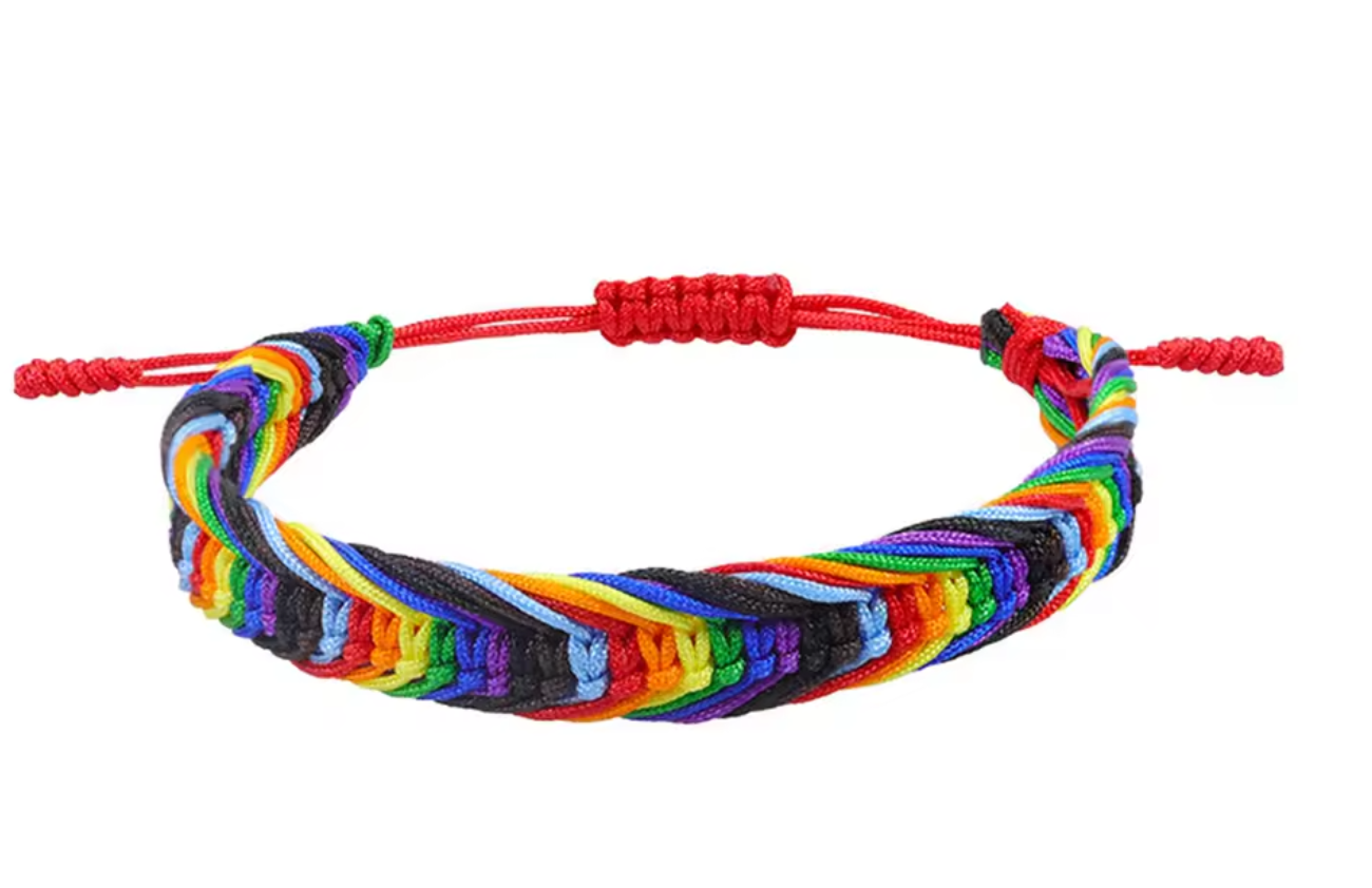 Rainbow Pride woven cord bracelet with adjustable closure and colorful braided rainbow design