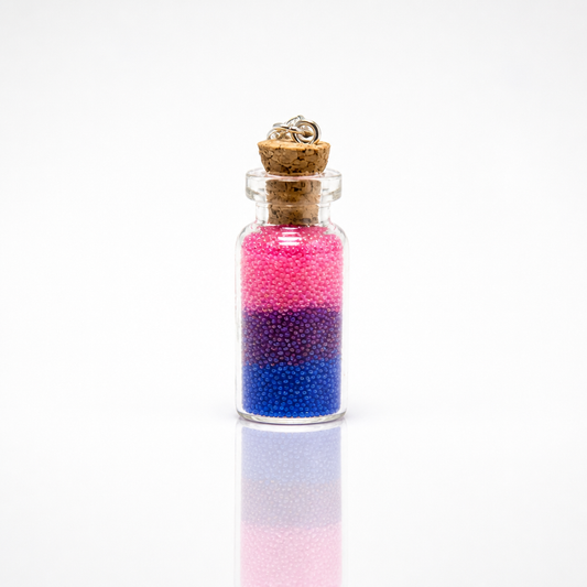 Bisexual pride bottle necklace with layered pink purple and blue micro-beads inside tiny glass bottle pendant