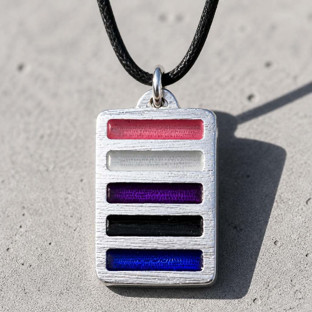 Handcrafted pewter pendant featuring the Genderfluid Pride flag in a modern geometric design on an adjustable black waxed cord on a concrete background