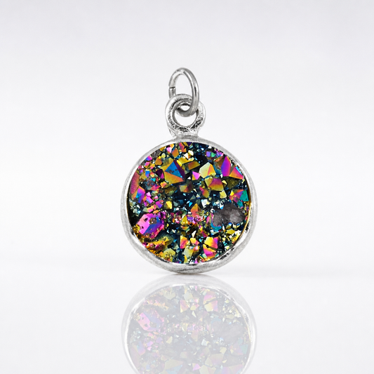 Small iridescent natural stone circle pendant necklace with shimmering rainbow-like crystal colors in a silver-tone setting.