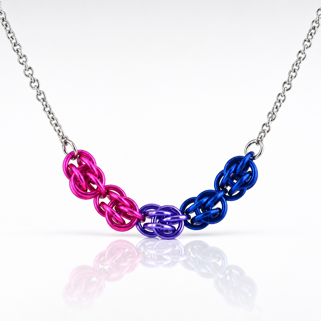 Hand-linked bisexual pride chainmail necklace featuring pink, purple, and blue aluminum rings on an adjustable stainless steel chain on a white background