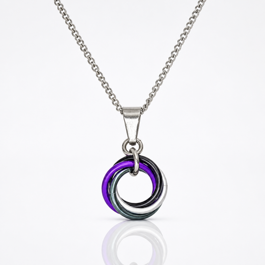 Handcrafted Asexual (ACE) Pride swirl pendant necklace featuring aluminum rings in Asexual Pride flag colors on an adjustable stainless steel chain.