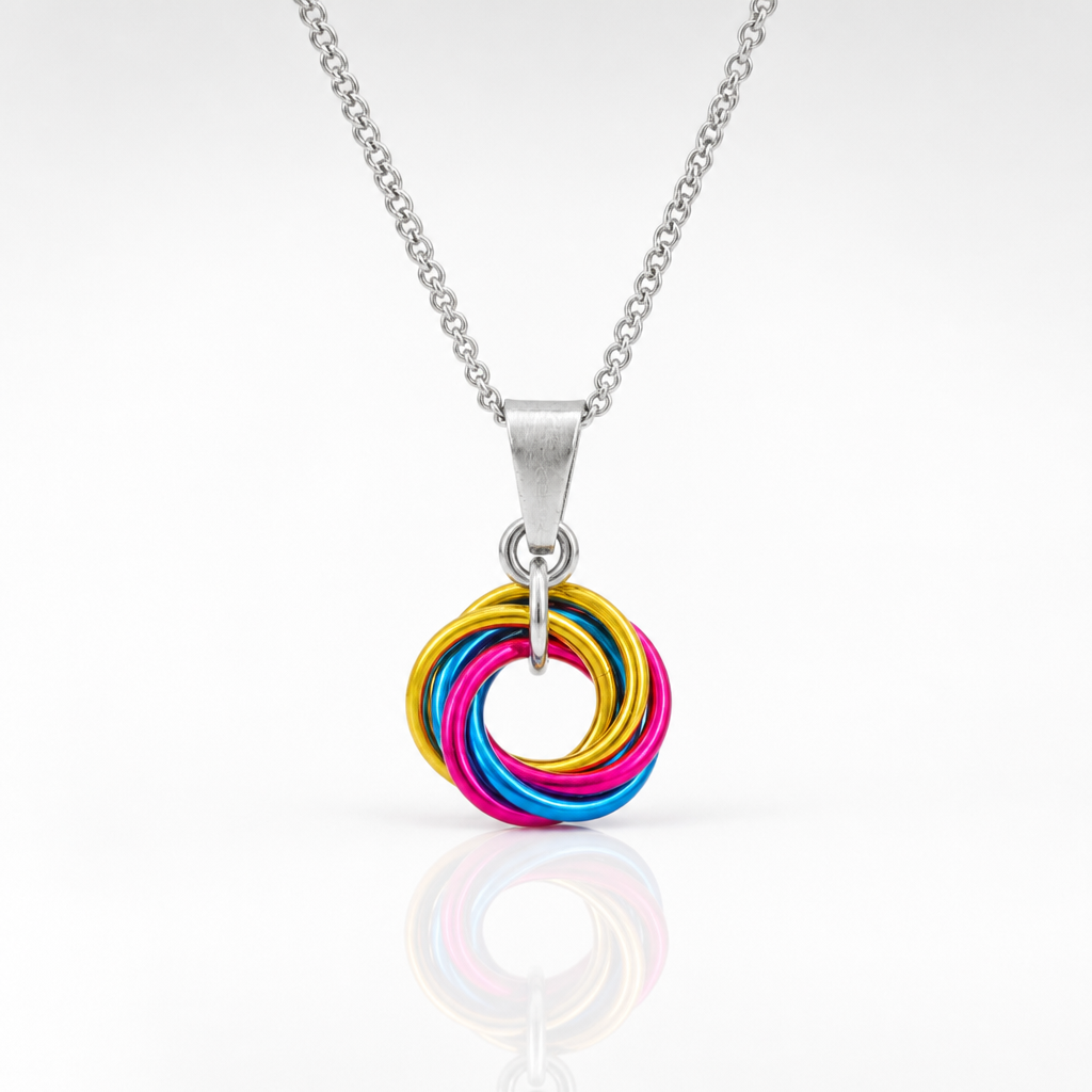 Handcrafted Pansexual Pride swirl pendant necklace featuring pink, yellow, and blue aluminum rings on an adjustable stainless steel chain.