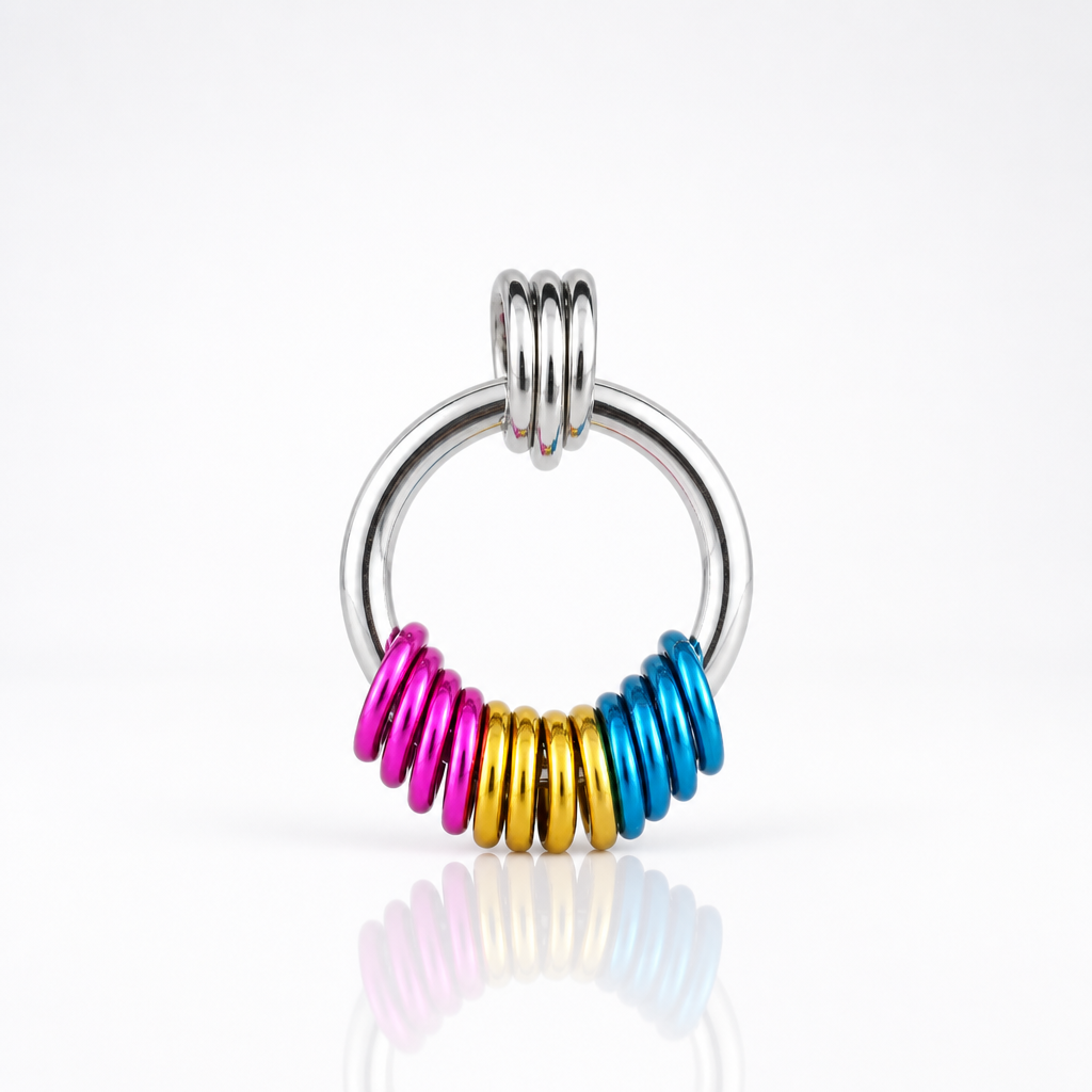 Handcrafted Pansexual Pride coil fidget necklace featuring free-spinning pink, yellow, and blue aluminum rings on an adjustable stainless steel chain on a white background