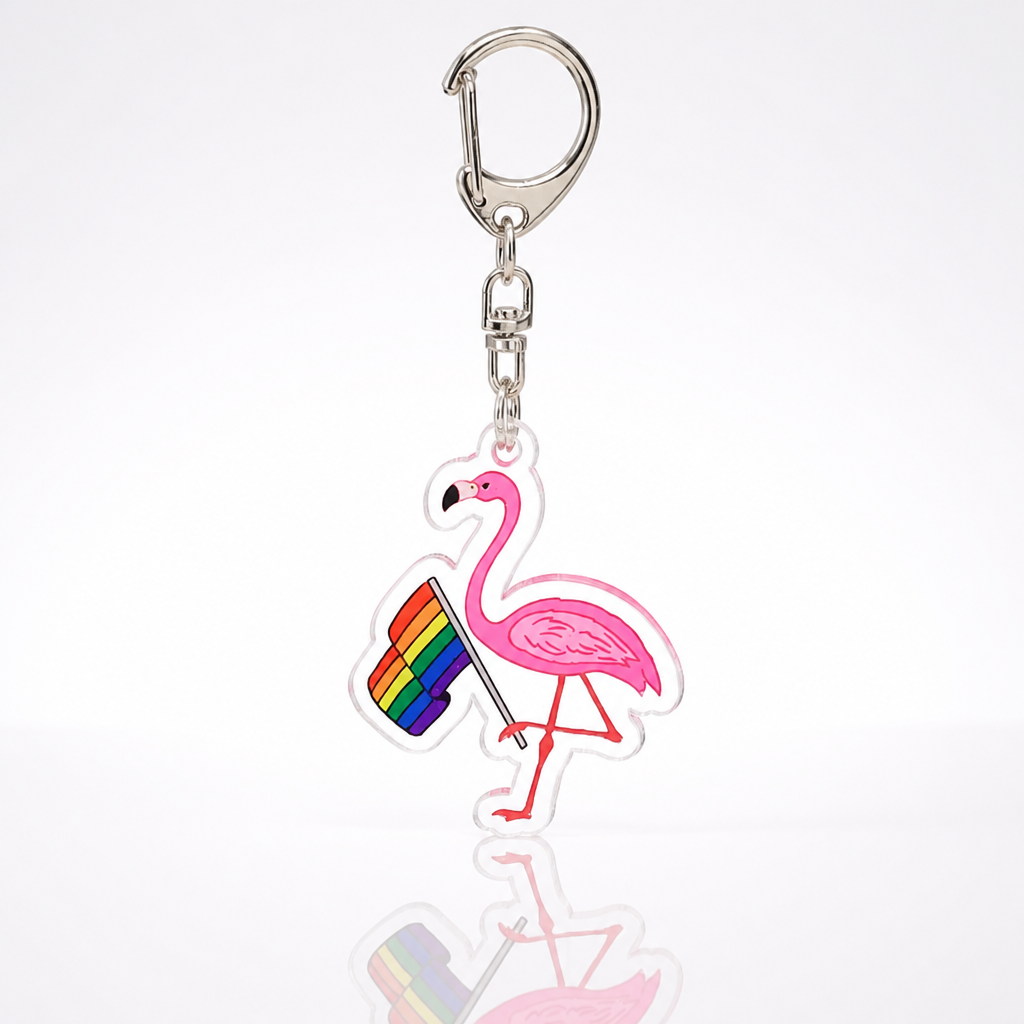 Pink flamingo acrylic keychain holding LGBTQ rainbow pride flag