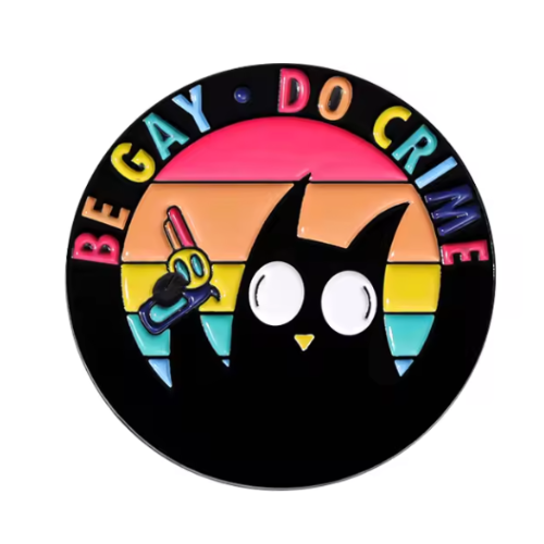 Be Gay Do Crime enamel pin featuring black cat holding rainbow gun with LGBTQ Pride colors