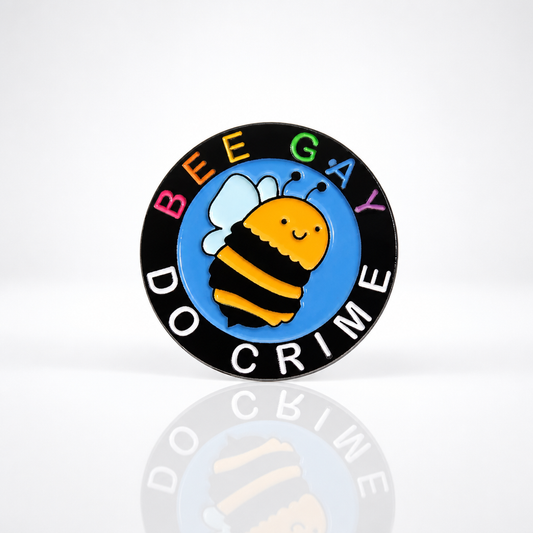 Be Gay Do Crime enamel pin featuring cute bumble bee with colorful queer styling