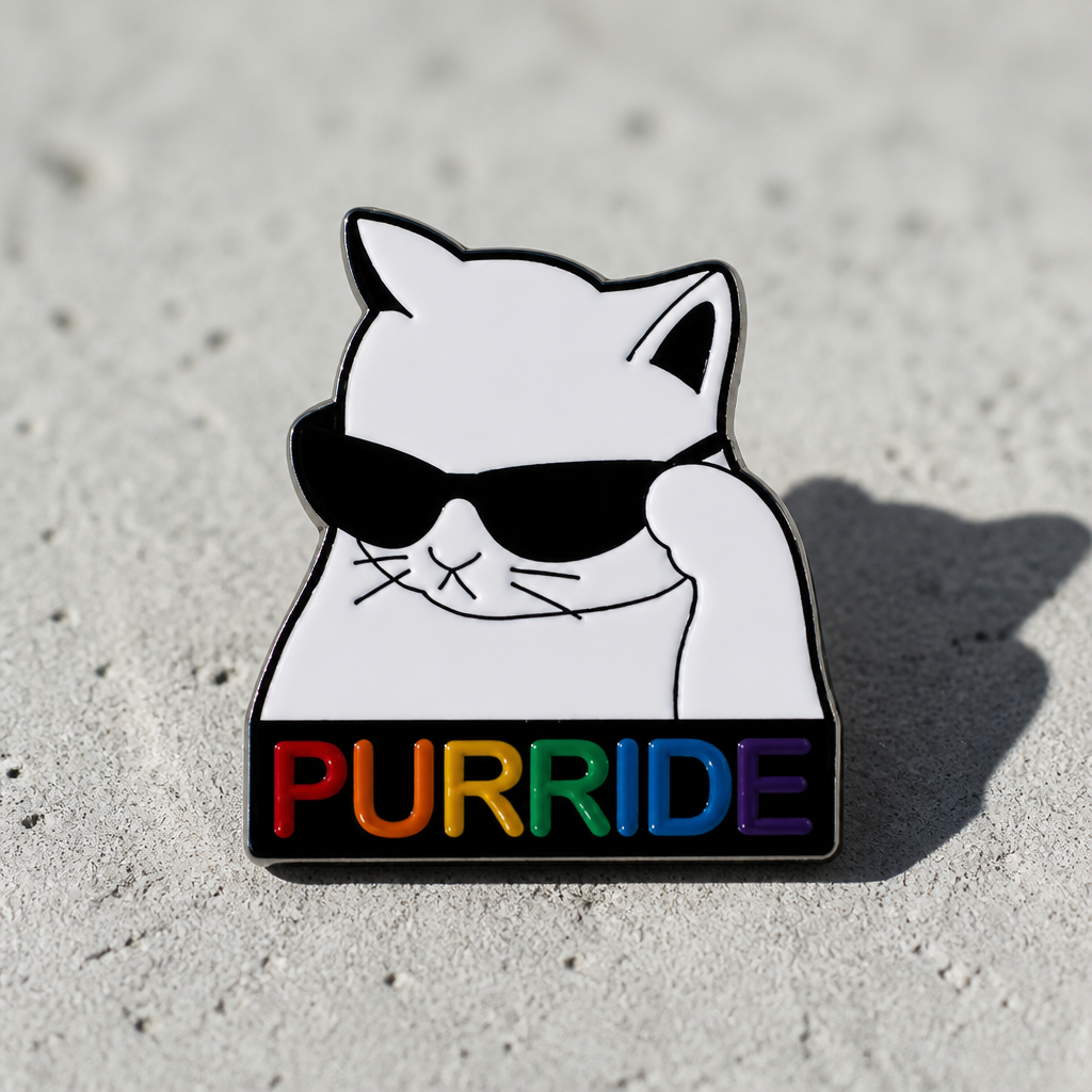 Purride Cat enamel pin featuring white cat with sunglasses and rainbow Pride lettering on a concrete surface