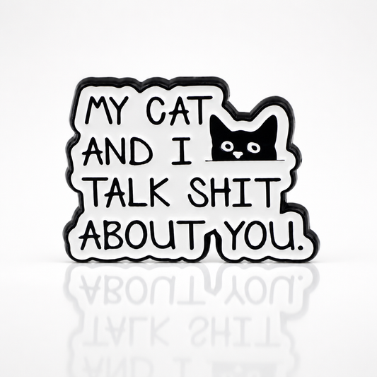 Funny enamel pin featuring black cat and text that says My Cat and I Talk Shit About You