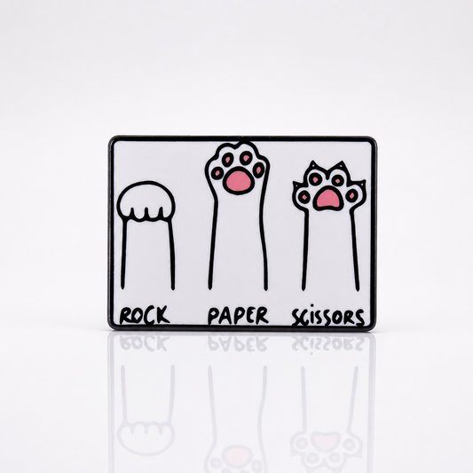 Cats Playing Rock Paper Scissors enamel pin featuring kitten paws and claws design