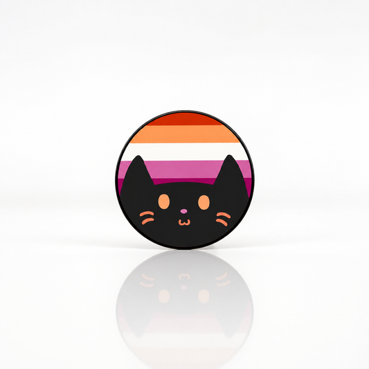 Hard enamel pin featuring a cute black kitty in front of the Lesbian Pride flag in orange, white, pink, and magenta sunset tones.