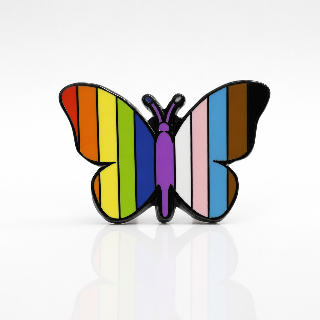 Butterfly enamel pin featuring rainbow and Progress Pride flag colors