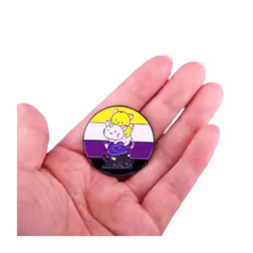 Nonbinary Pride Cats enamel pin featuring stacked cartoon cats in nonbinary flag colors on a hand