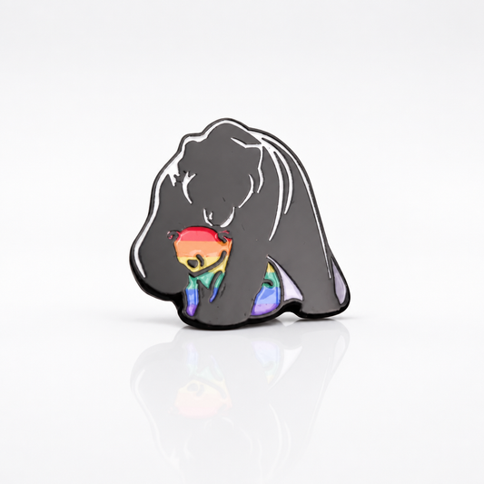 Mama bear enamel pin hugging a small rainbow Pride cub