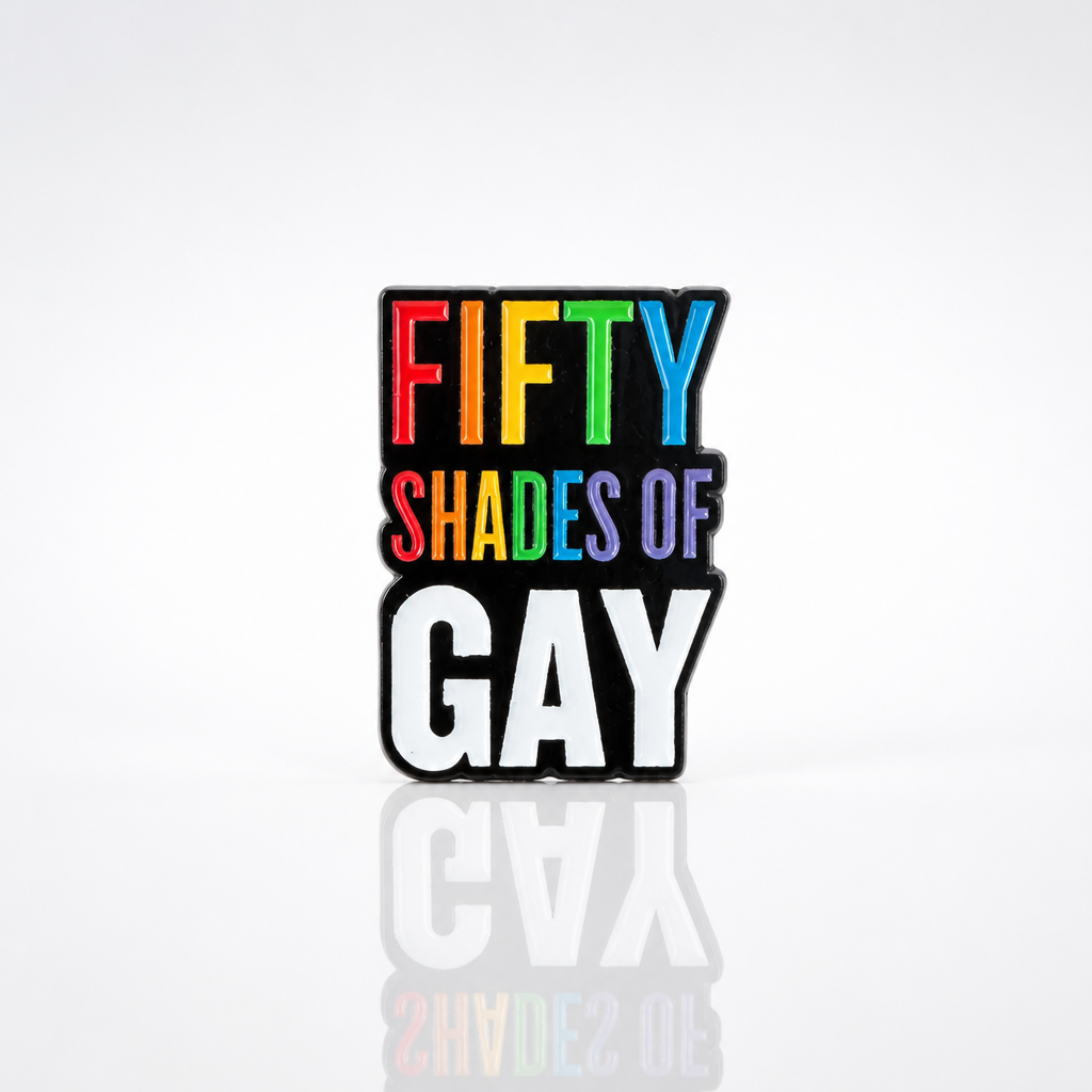 Rainbow enamel pin reading “Fifty Shades of Gay”