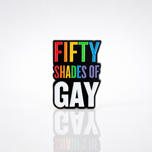 Rainbow enamel pin reading “Fifty Shades of Gay”