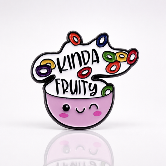 Cute enamel pin featuring smiling cereal bowl and the phrase “Kinda Fruity”