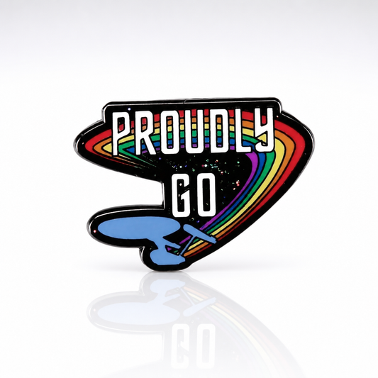 Proudly Go rainbow enamel pin with glittery sci-fi inspired Pride artwork