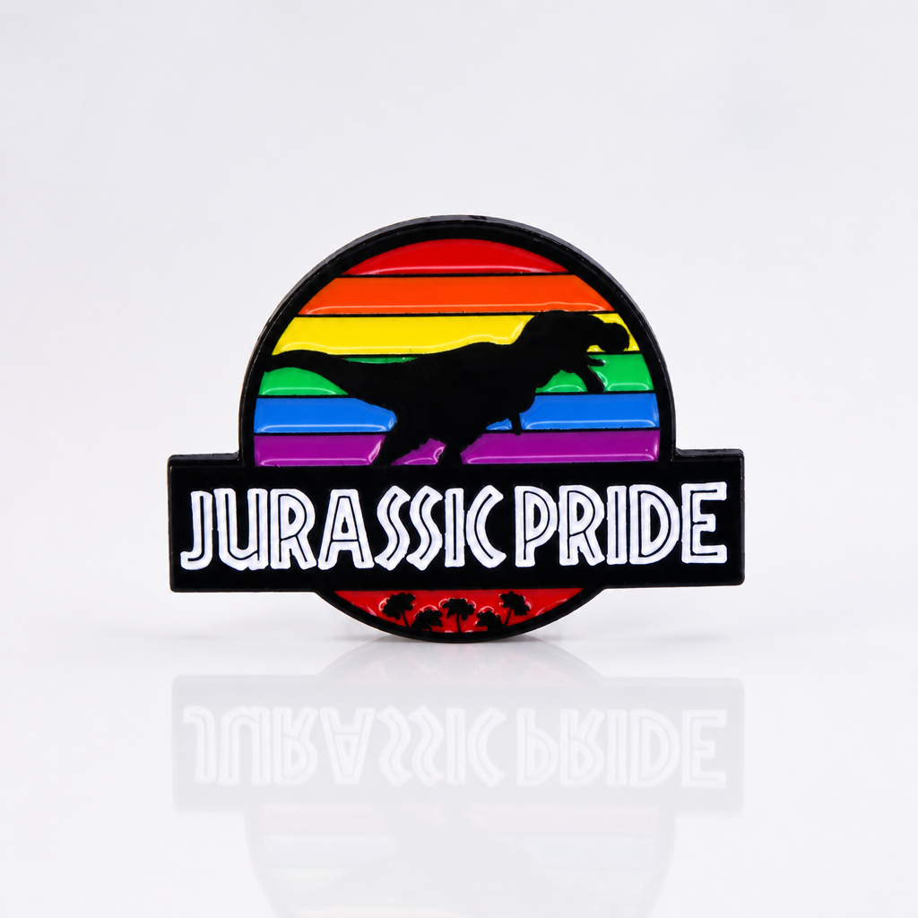 Rainbow dinosaur enamel pin with the phrase “Jurassic Pride”